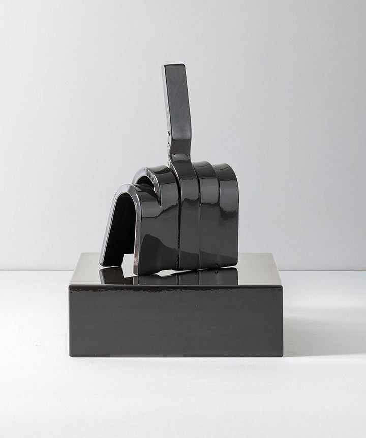 Gesture | Middle finger made from hand sculpted metal set on solid marble base.