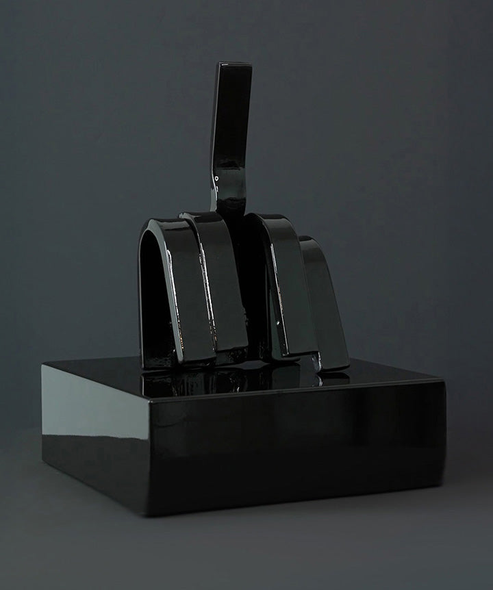 Gesture | Middle finger made from hand sculpted metal set on solid marble base.