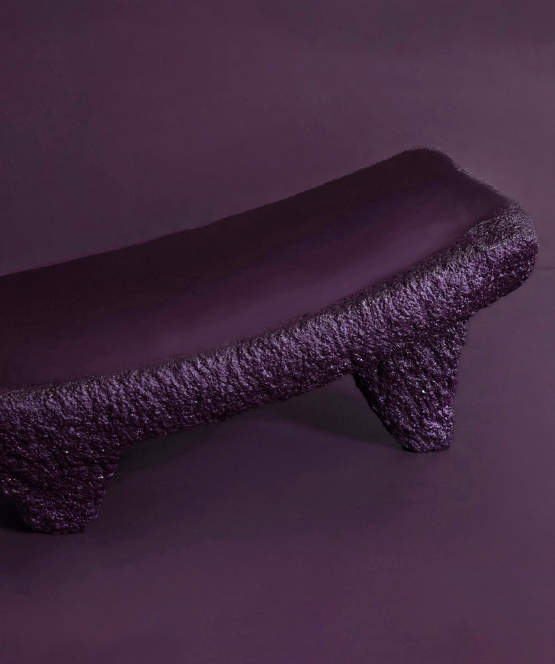 Volcanic Rock | Purple textured Metate slabs made from Basalt volcanic rock on a dark purple background