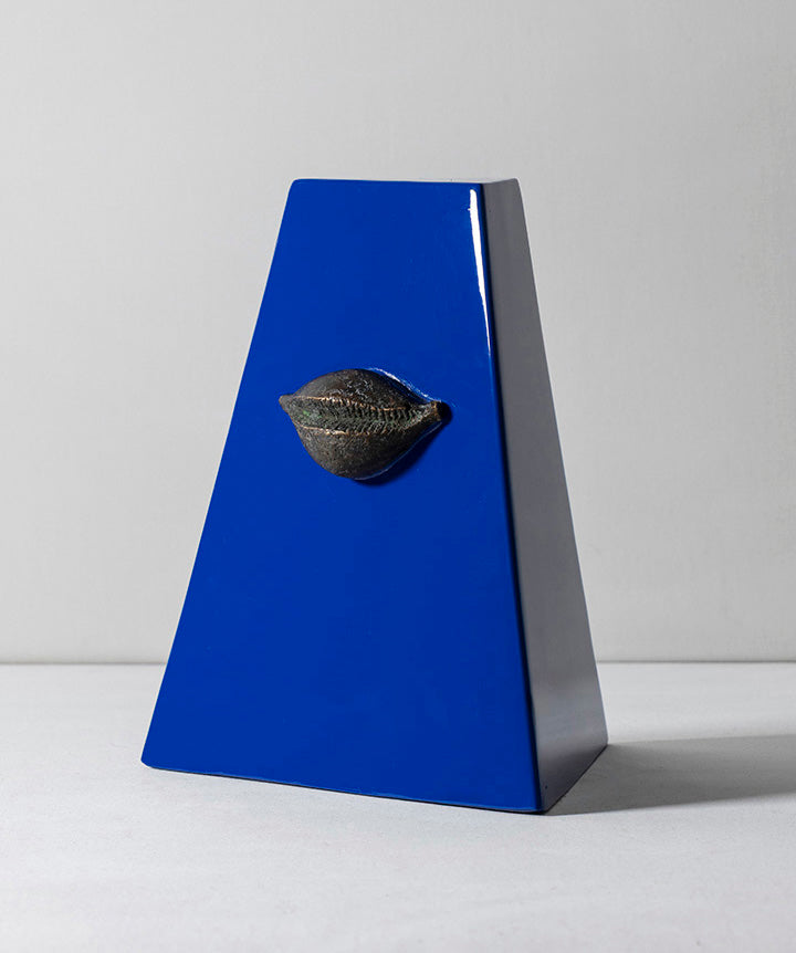 French Kiss | Cast bronze lips set in commissioned metal pyramid.