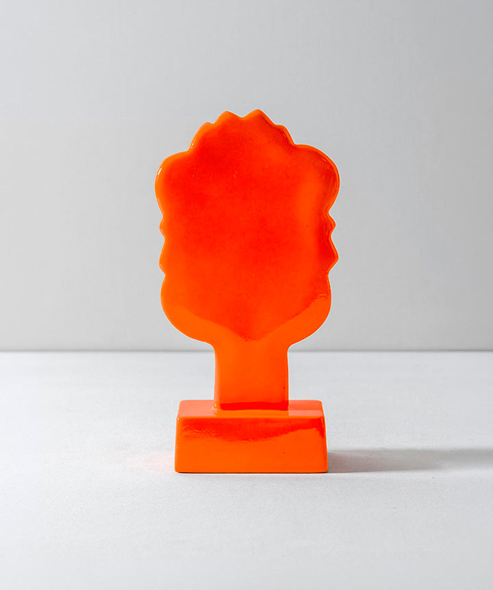 A Muse | Modernist glass face coated in a custom high gloss urethane-based paint and finished in 100% orange wool felt. 