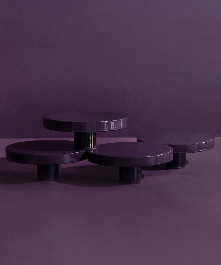 Reunited | Four independent cast iron cylinders that were hand welded together and coated in a custom high gloss urethane-based paint. 