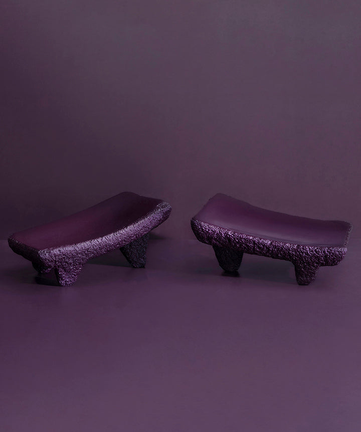 Volcanic Rock | Pair of purple textured Metate slabs made from Basalt volcanic rock on a dark purple background
