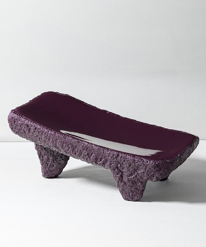 Volcanic Rock | Purple textured Metate slabs made from Basalt volcanic rock on a white background