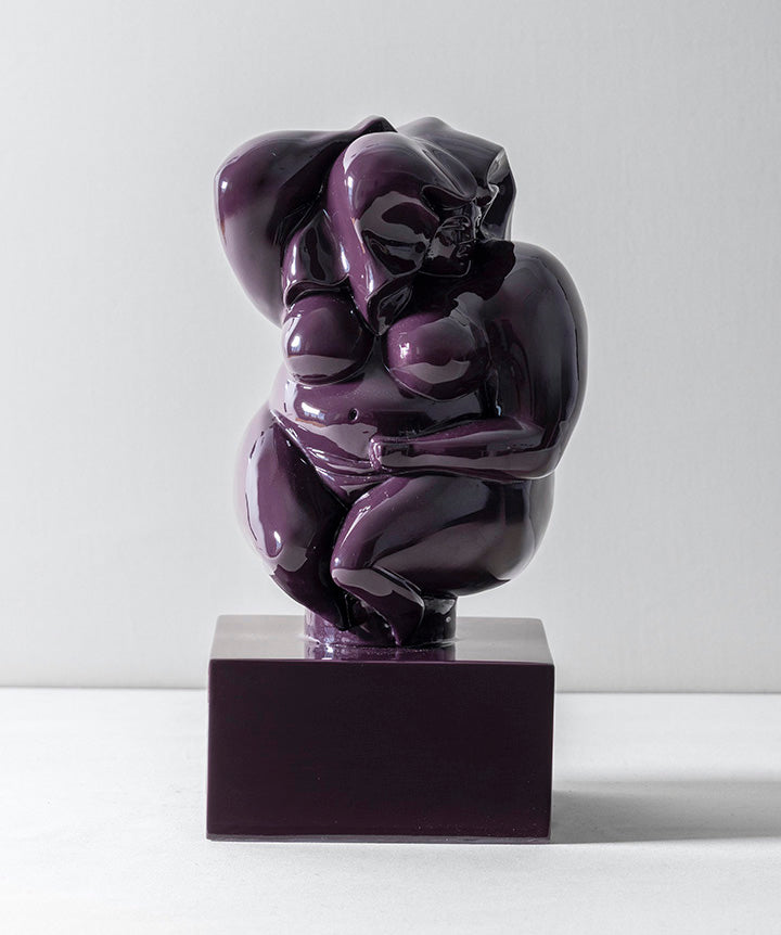 Zoftig Woman | Voluptuous bronze woman on solid marble coated in a custom high gloss urethane-based paint on a white background.